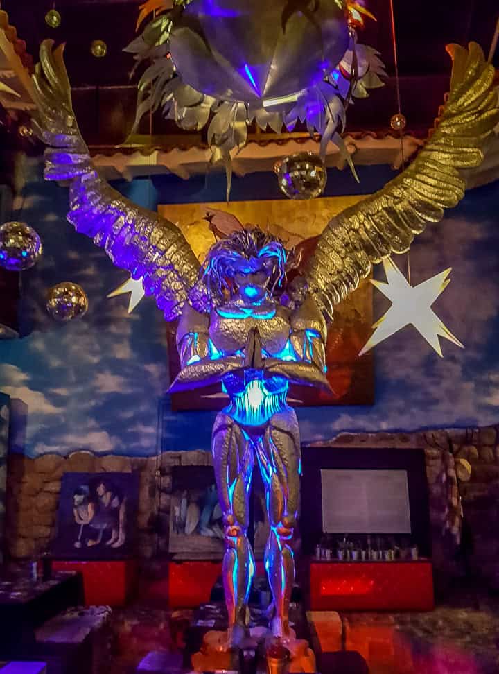 Fallen Angel Restaurant Cusco giant angel statue