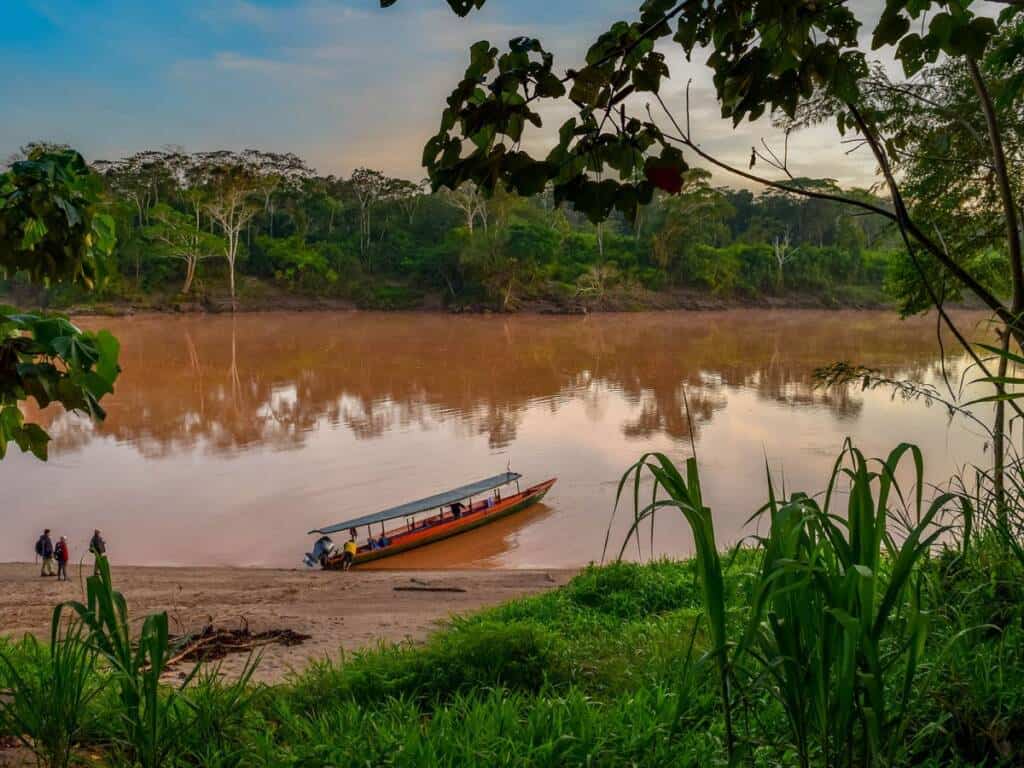 Ready to board the boat on the Tambopata River in Peru