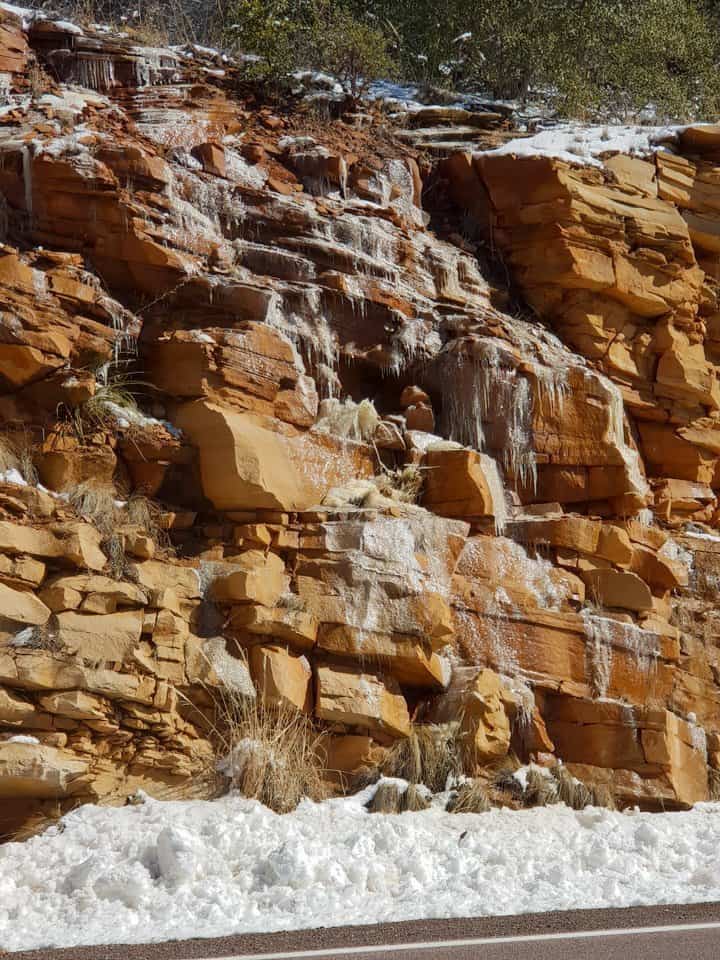 Icicles on the rock show how cold it was