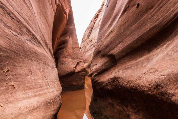 The hike to Zebra Slot Canyon is a moderate 5.3 miles round-trip hike through the rocky landscape just outside of Escalante