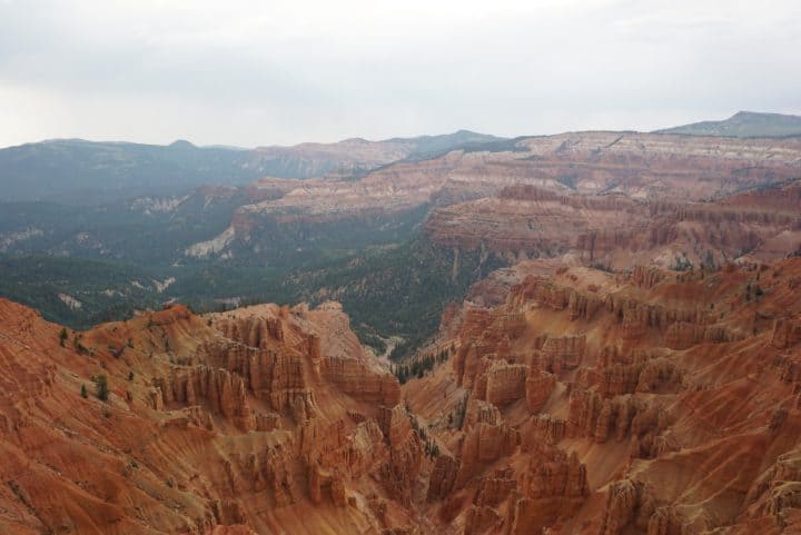 Cedar Breaks National Monument is a canyon filled with spires, cliffs, and red rock