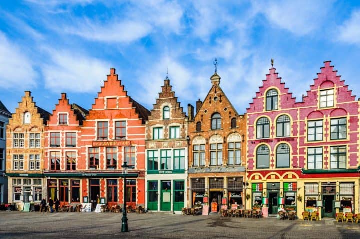 Colorful old brick houses in the Market Square in the UNESCO World Heritage Old Town of Bruges, Belgium