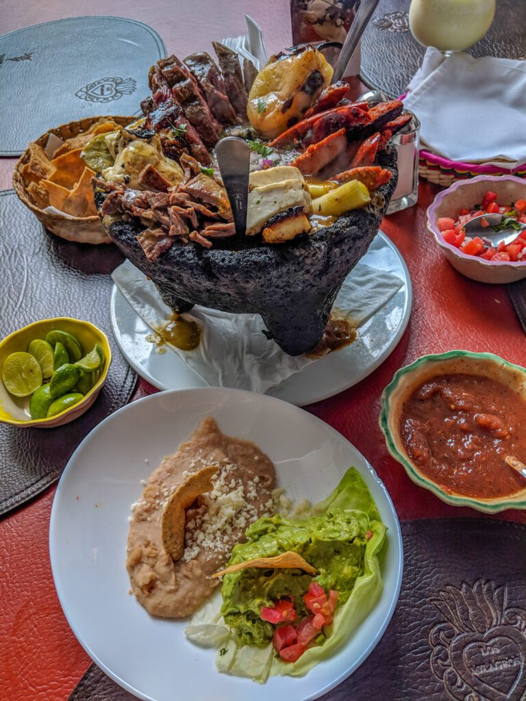 Molten cheese served in a lava rock bowl with your selection of meat, cheese, and vegetables. Not to be missed.