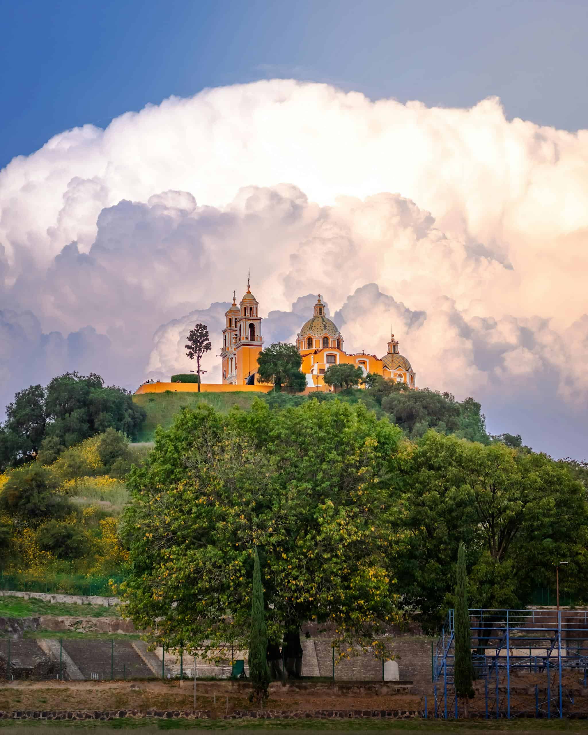 Our Lady of Remedies Sanctuary in Cholula against Majestic White Cloud