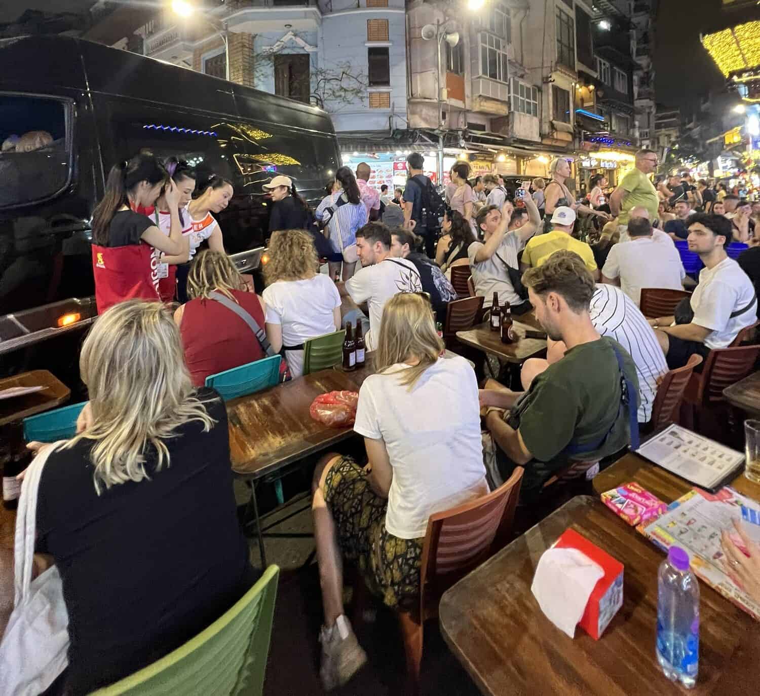 tiny tables and chairs but cheap drinks at beer street hanoi