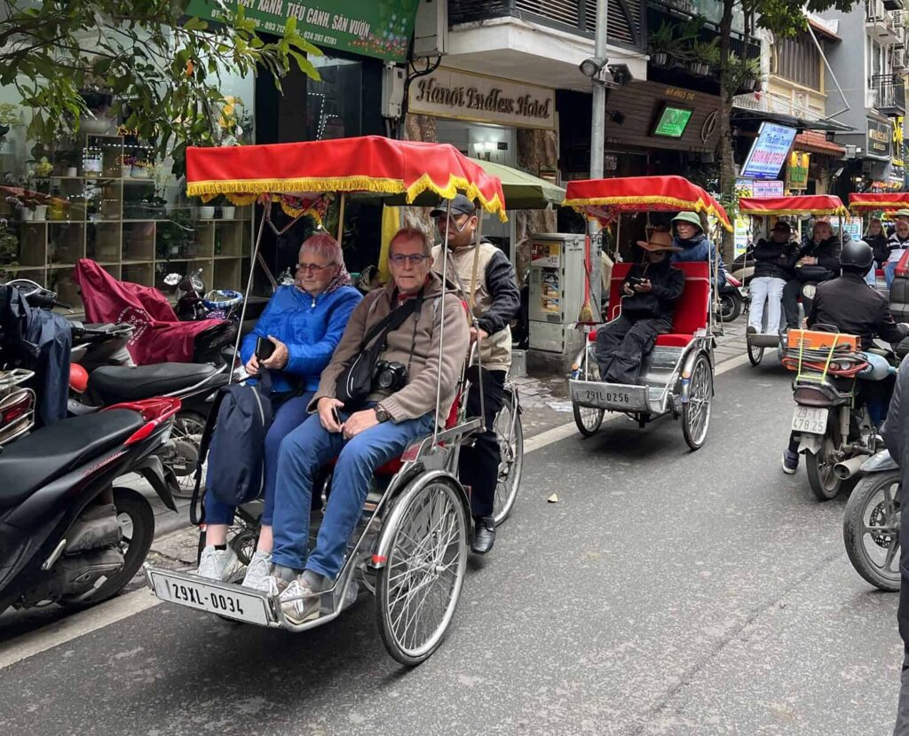 taking a cyclo ride through the Old Quarter of Hanoi