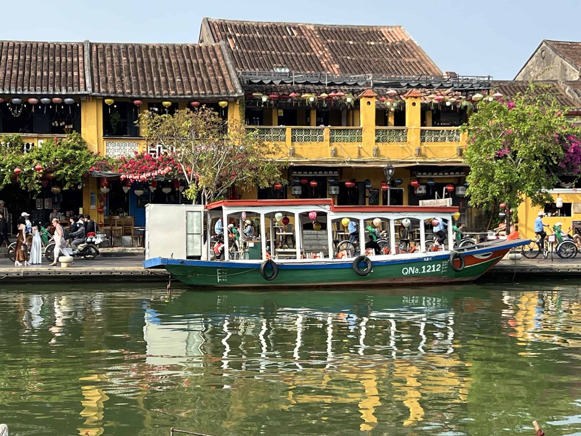 reflections on the river in hoi an