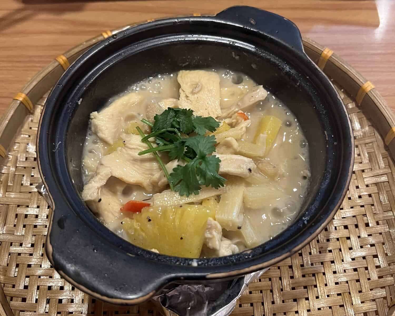 Chicken pineapple and sugarcane in clay at the claypot restaurant in hoi an
