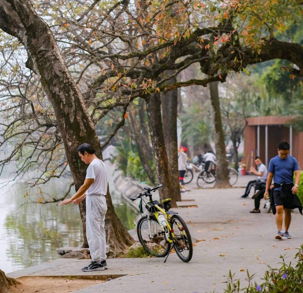 People on the Promenade by the lake in Hanoi