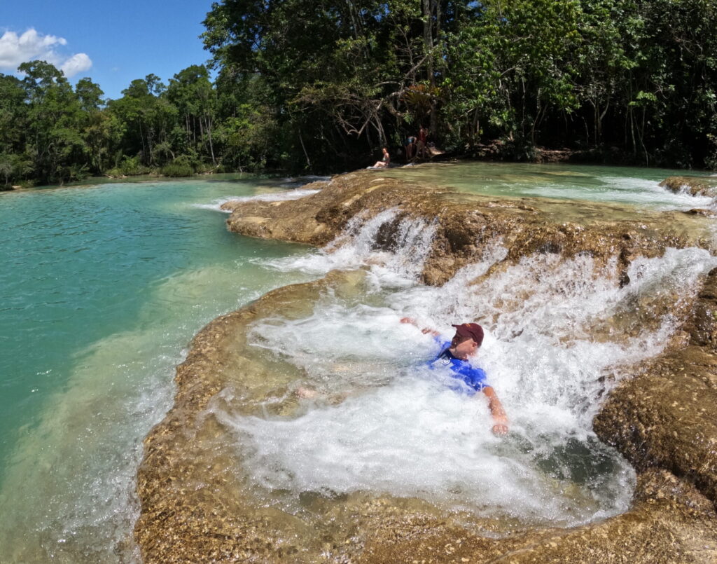 sitting in one of the many rock pools at Cascadas Roberto Barrios in Chiapas